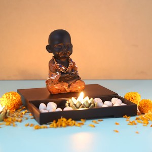 Cute Buddha Monk Sitting with T light holder and Pebbles