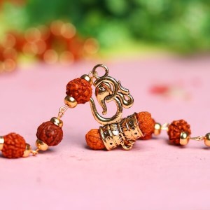 Striking Rudraksha Om Bracelet