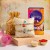 matki-standing-kanha-rakhi-with-dry-fruits-chocolates-set-of-2-main