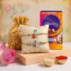 matki-standing-kanha-rakhi-with-dry-fruits-chocolates-set-of-2-main